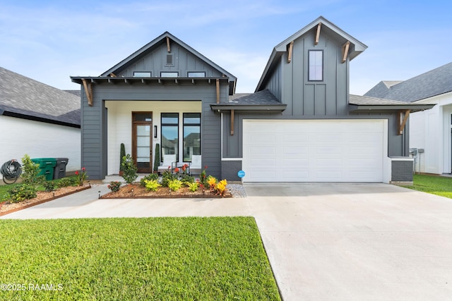 127 Lakes Edge Dr, Broussard, LA 70518 - modern farmhouse style home featuring board and batten siding, concrete driveway, a front yard, roof with shingles, and an attached garage