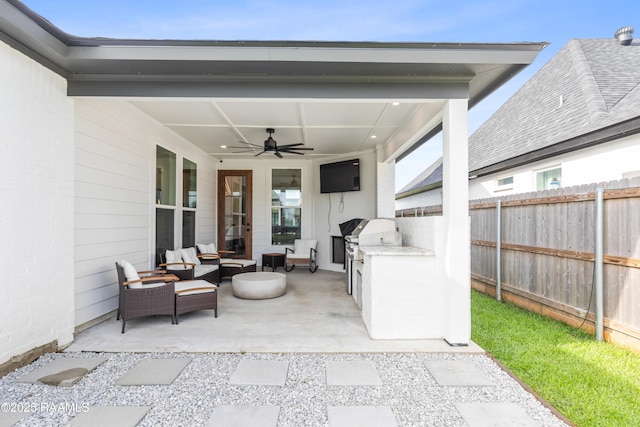 127 Lakes Edge Dr, Broussard, LA 70518 - view of patio / terrace with exterior kitchen, a ceiling fan, and an outdoor living space