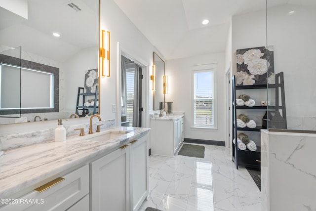 127 Lakes Edge Dr, Broussard, LA 70518 - full bath with lofted ceiling, two vanities, recessed lighting, and marble finish flooring