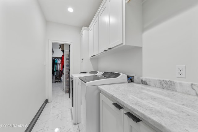 127 Lakes Edge Dr, Broussard, LA 70518 - laundry area with light marble finish floors, washing machine and dryer, cabinet space, and recessed lighting
