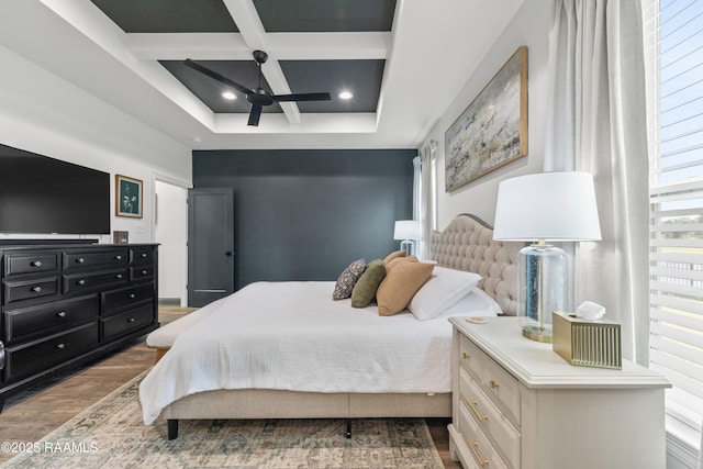 127 Lakes Edge Dr, Broussard, LA 70518 - bedroom featuring coffered ceiling, wood finished floors, and beamed ceiling