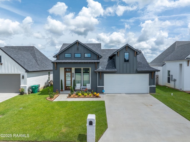 127 Lakes Edge Dr, Broussard, LA 70518 - view of front facade featuring board and batten siding, driveway, roof with shingles, and a standing seam roof