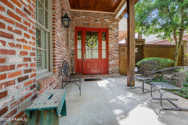 302 River Ranch Blvd, Lafayette, LA 70508 - view of exterior entry with brick siding and a porch