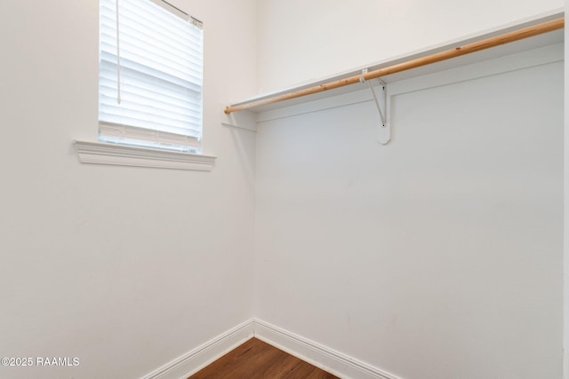 213 Hidden Ridge Dr, Lafayette, LA 70507 - walk in closet featuring dark wood-type flooring