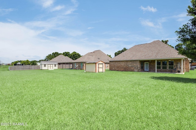 213 Hidden Ridge Dr, Lafayette, LA 70507 - fenced backyard featuring a storage shed