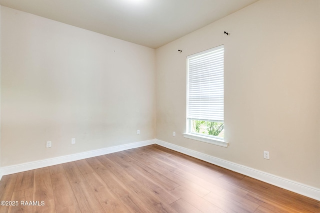 213 Hidden Ridge Dr, Lafayette, LA 70507 - spare room with wood finished floors and baseboards