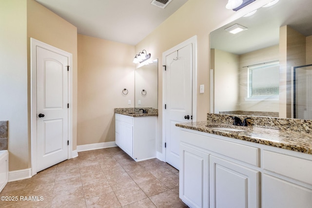 213 Hidden Ridge Dr, Lafayette, LA 70507 - full bath featuring two vanities, a tub, tile patterned flooring, and a shower