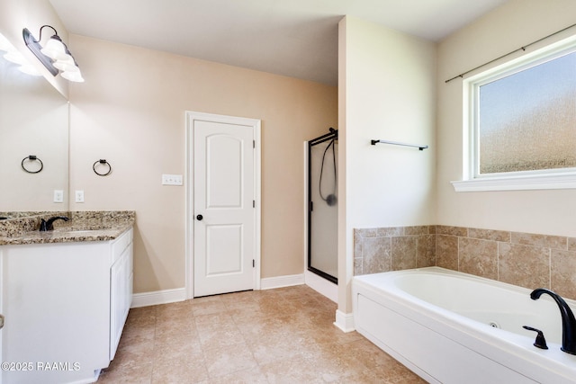 213 Hidden Ridge Dr, Lafayette, LA 70507 - bathroom featuring a jetted tub, vanity, and a stall shower