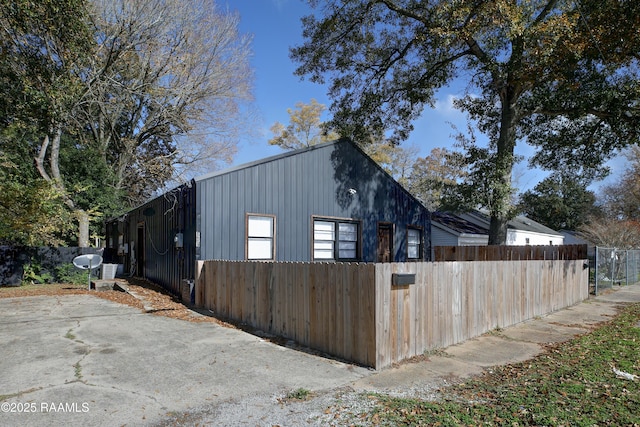 807/809 E Vermilion St, Abbeville, LA 70510 - view of side of home featuring board and batten siding