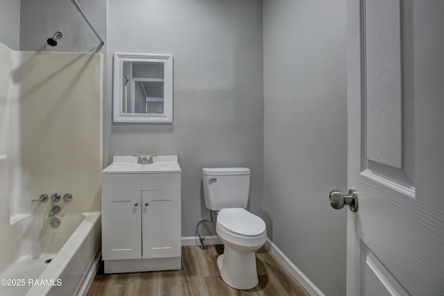 807/809 E Vermilion St, Abbeville, LA 70510 - bathroom featuring wood finished floors, vanity, and bathtub / shower combination