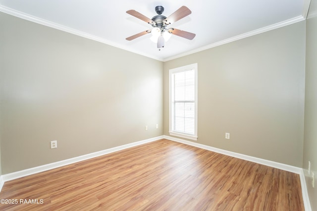 1518 S Patout St, New Iberia, LA 70560 - empty room with light wood finished floors, crown molding, and ceiling fan