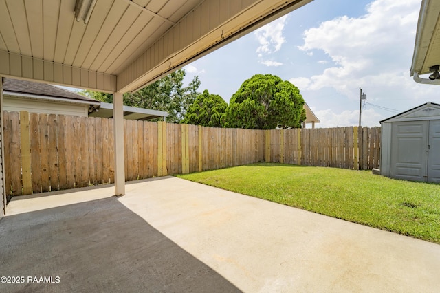 1518 S Patout St, New Iberia, LA 70560 - fenced backyard featuring a patio and a storage shed