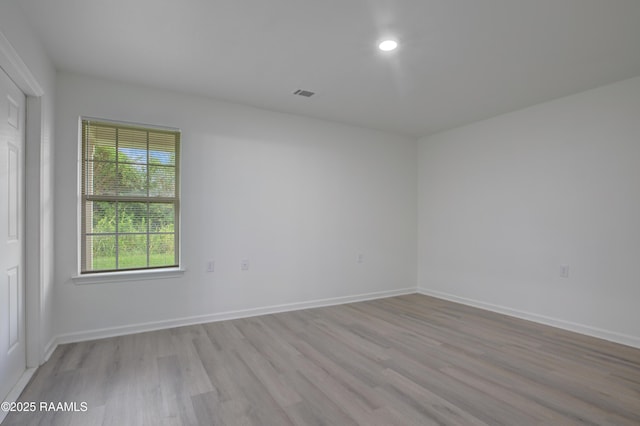 1005 W End Dr, New Iberia, LA 70560 - empty room with light wood-style flooring and recessed lighting