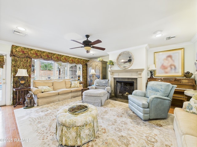 109 Canterbury Rd, Lafayette, LA 70503 - living room featuring ornamental molding, ceiling fan, a high end fireplace, and wood finished floors