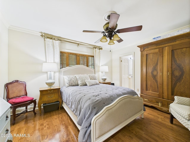 109 Canterbury Rd, Lafayette, LA 70503 - bedroom with wood finished floors, ornamental molding, and ceiling fan
