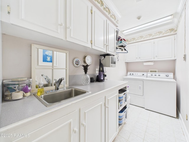 109 Canterbury Rd, Lafayette, LA 70503 - washroom with cabinet space, washer and clothes dryer, and light tile patterned floors