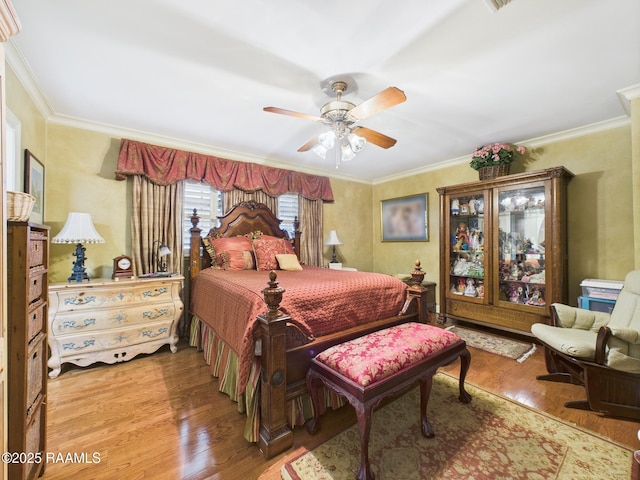 109 Canterbury Rd, Lafayette, LA 70503 - bedroom featuring wood finished floors, crown molding, and ceiling fan