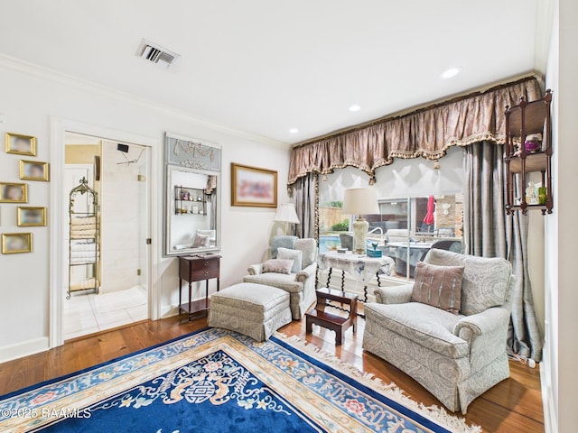 109 Canterbury Rd, Lafayette, LA 70503 - living area with wood finished floors, crown molding, and recessed lighting