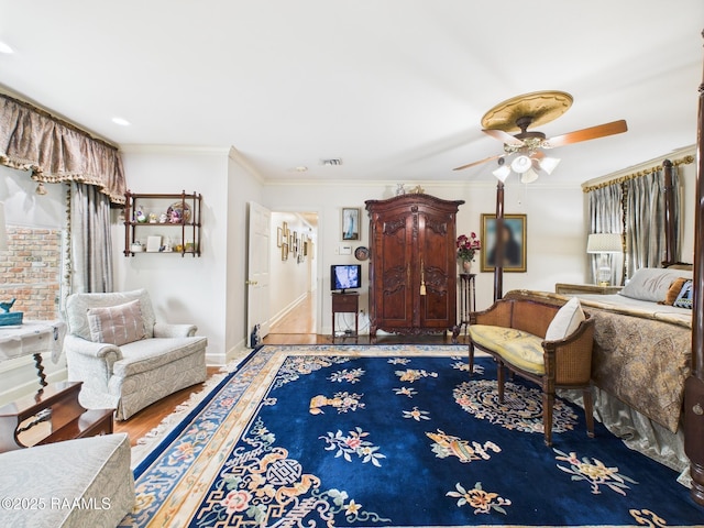 109 Canterbury Rd, Lafayette, LA 70503 - bedroom with ornamental molding, wood finished floors, and a ceiling fan