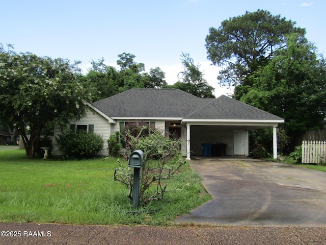 401 Aimee Dr, Carencro, LA 70520 - view of front of property featuring concrete driveway, a front yard, an attached carport, and roof with shingles