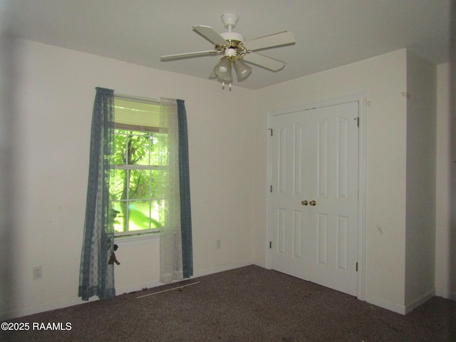 401 Aimee Dr, Carencro, LA 70520 - unfurnished bedroom with carpet floors and a ceiling fan