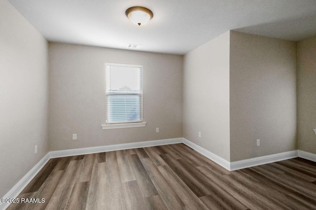 115 Sandstone Ave, Scott, LA 70583 - spare room featuring wood finished floors and baseboards