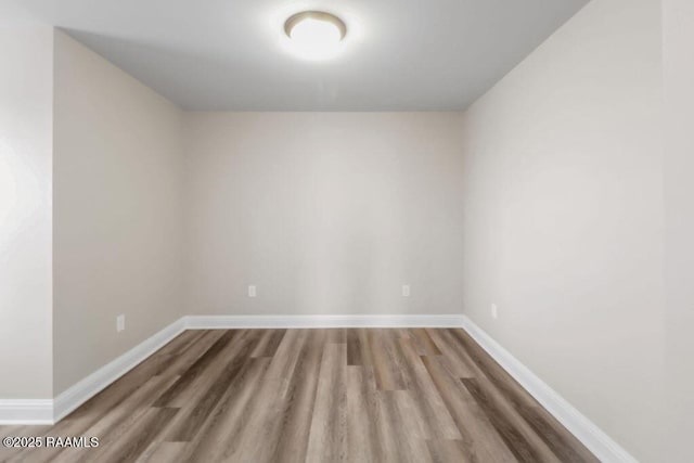 115 Sandstone Ave, Scott, LA 70583 - empty room with wood finished floors and baseboards