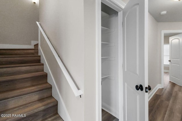 115 Sandstone Ave, Scott, LA 70583 - stairs with wood finished floors and baseboards