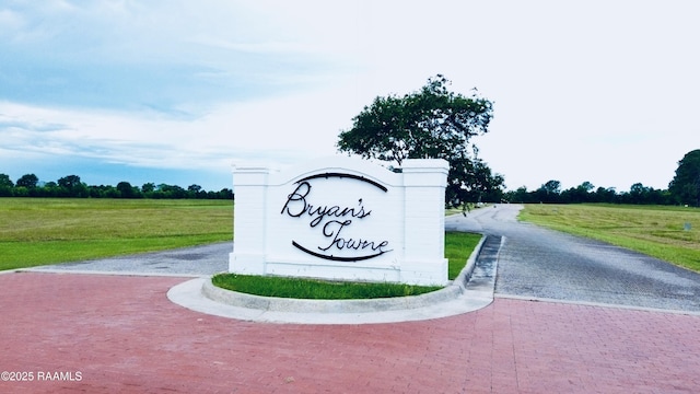 11512 Baker Senior Dr, Abbeville, LA 70510 - community sign with decorative driveway