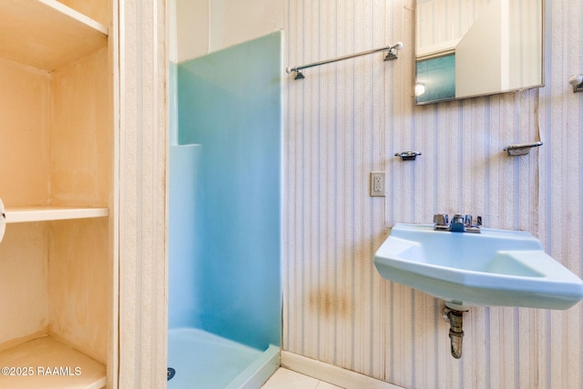 208 W Church St, Opelousas, LA 70570 - full bathroom featuring a stall shower and wallpapered walls