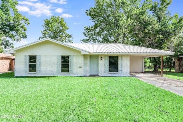 126 Lindsey Cir, Carencro, LA 70520 - single story home featuring brick siding, a carport, driveway, and a front lawn