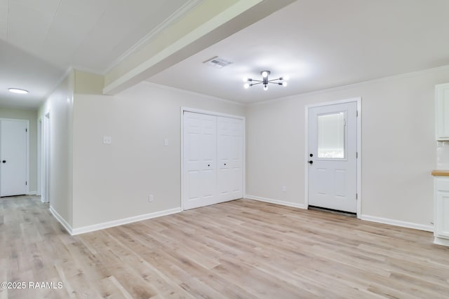 126 Lindsey Cir, Carencro, LA 70520 - unfurnished living room featuring ornamental molding and light wood finished floors