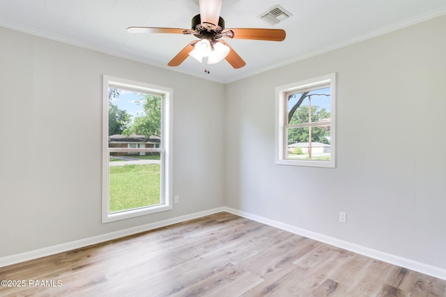 126 Lindsey Cir, Carencro, LA 70520 - unfurnished room featuring plenty of natural light, light wood-style flooring, crown molding, and a ceiling fan