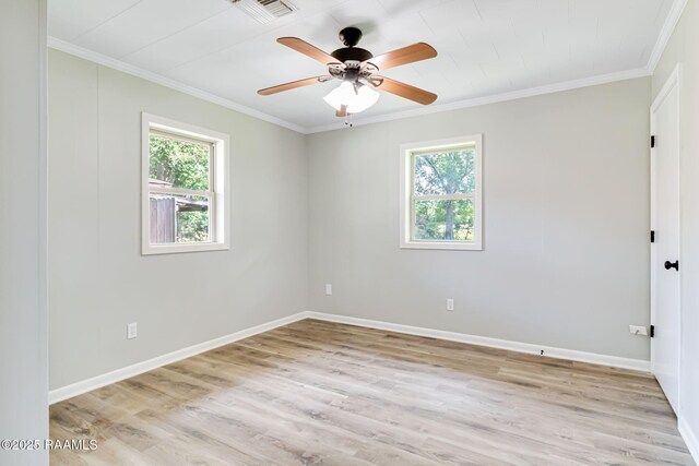 126 Lindsey Cir, Carencro, LA 70520 - unfurnished room with plenty of natural light, ornamental molding, light wood-style flooring, and a ceiling fan