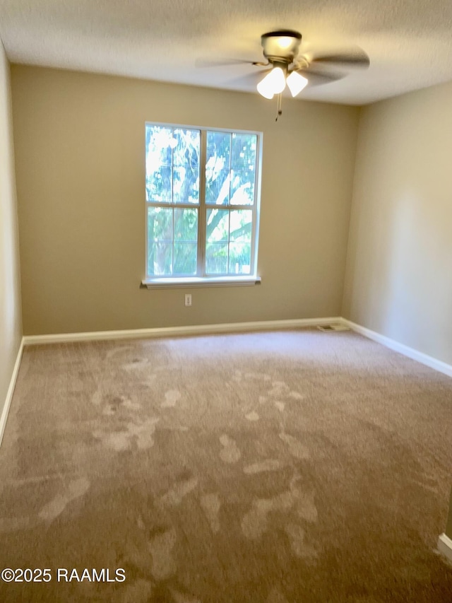 113 Earline Dr, Lafayette, LA 70506 - unfurnished room featuring a ceiling fan, carpet flooring, and a textured ceiling
