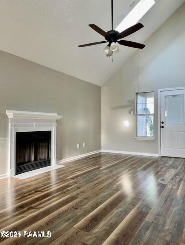 113 Earline Dr, Lafayette, LA 70506 - unfurnished living room featuring high vaulted ceiling, ceiling fan, wood finished floors, and a fireplace