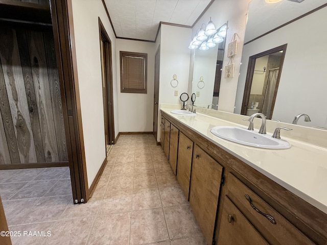 6516 Daspit Rd, New Iberia, LA 70563 - full bath featuring crown molding, double vanity, and tile patterned floors