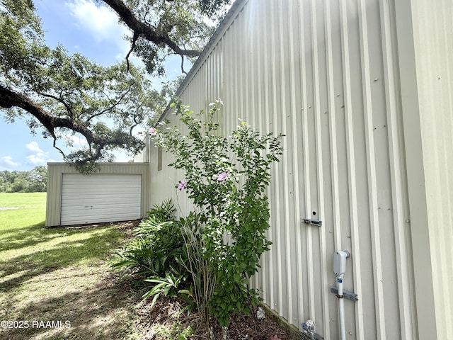 6516 Daspit Rd, New Iberia, LA 70563 - view of property exterior with a garage and a yard
