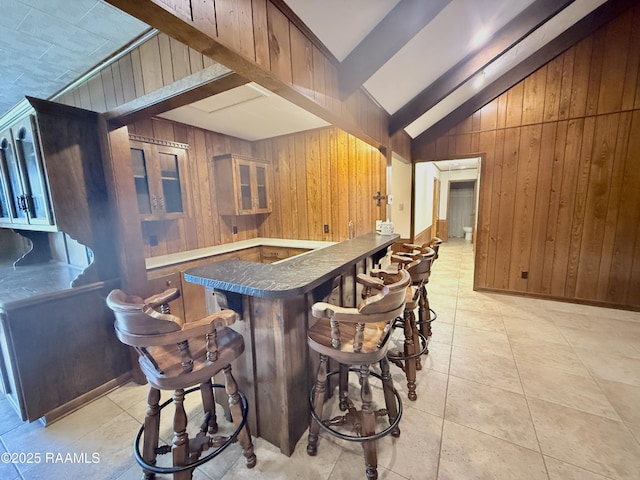 6516 Daspit Rd, New Iberia, LA 70563 - indoor bar with wooden walls and light tile patterned flooring