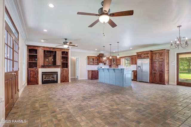 810 Fenetre Rd, Scott, LA 70583 - kitchen featuring stainless steel refrigerator with ice dispenser, brick patterned floors, recessed lighting, a kitchen island, and brown cabinetry