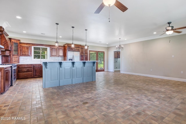810 Fenetre Rd, Scott, LA 70583 - kitchen with stainless steel range, a ceiling fan, tasteful backsplash, light countertops, and recessed lighting