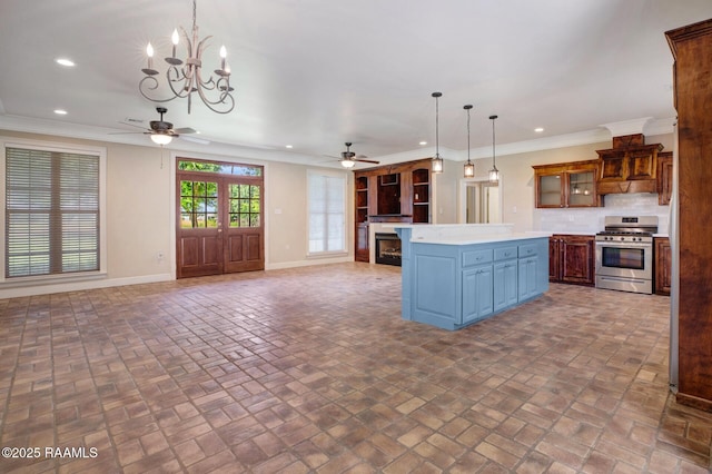 810 Fenetre Rd, Scott, LA 70583 - kitchen featuring stainless steel range with gas cooktop, a ceiling fan, brick patterned floors, recessed lighting, and ornamental molding