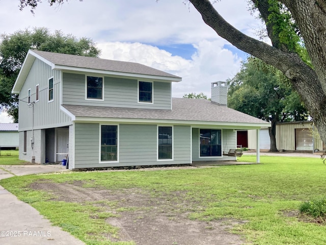 311 Fernway Ln, Duson, LA 70529 - view of front of property featuring a chimney, a front yard, and a shingled roof