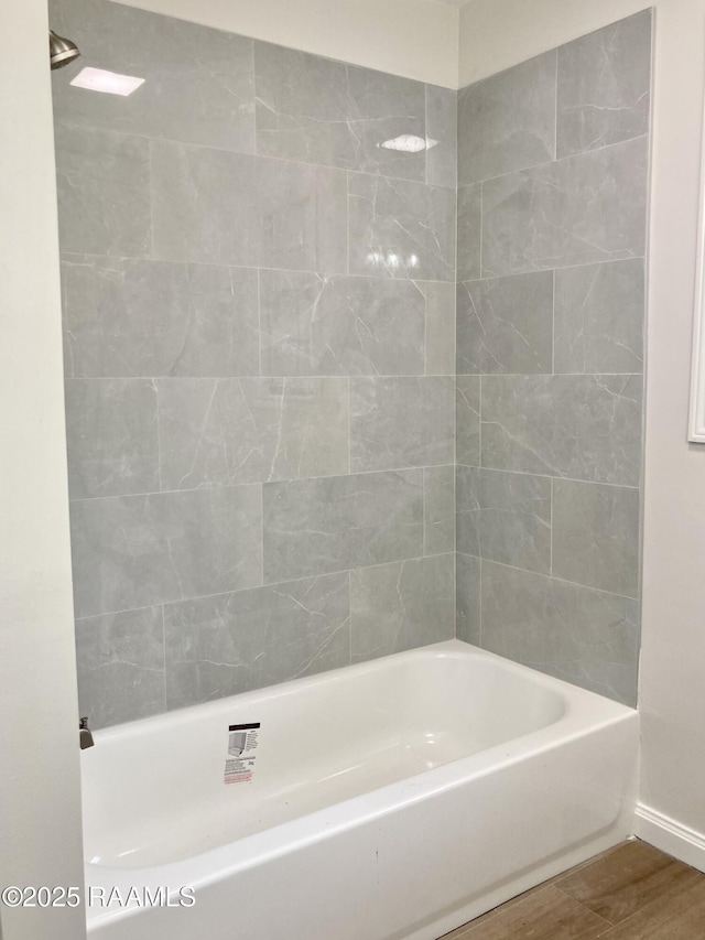 311 Fernway Ln, Duson, LA 70529 - full bathroom featuring wood finished floors and baseboards