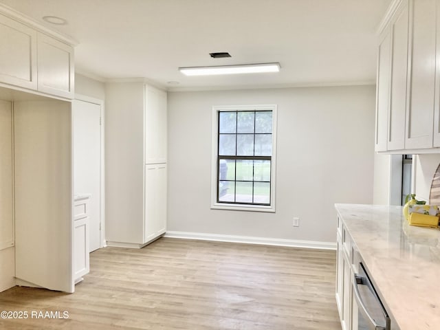 311 Fernway Ln, Duson, LA 70529 - kitchen with light wood finished floors, white cabinetry, light stone counters, and ornamental molding