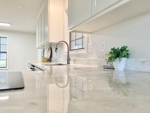 311 Fernway Ln, Duson, LA 70529 - kitchen with white cabinets and light stone countertops