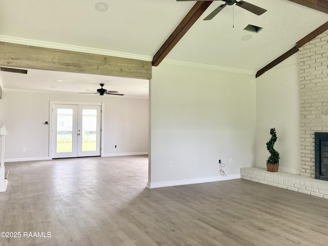 311 Fernway Ln, Duson, LA 70529 - unfurnished living room with ceiling fan, a fireplace, wood finished floors, and crown molding