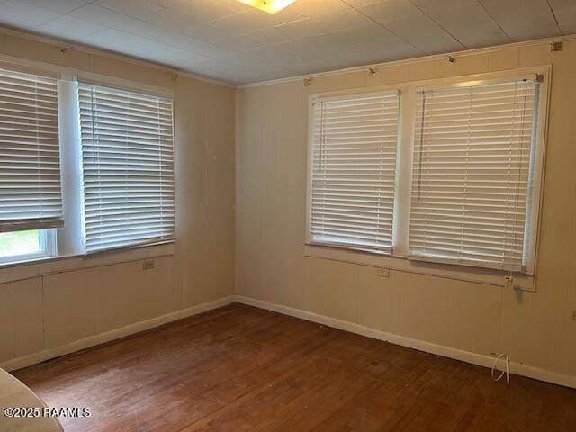 526 E Main St, New Iberia, LA 70560 - spare room featuring wood finished floors and ornamental molding