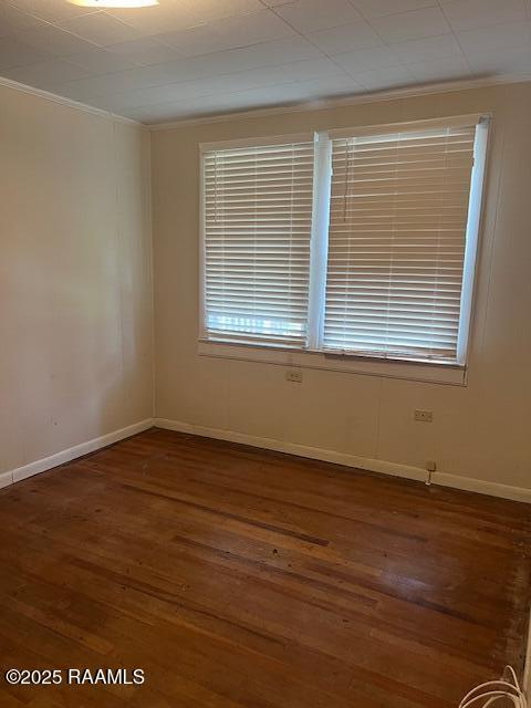 526 E Main St, New Iberia, LA 70560 - unfurnished room featuring ornamental molding and wood finished floors