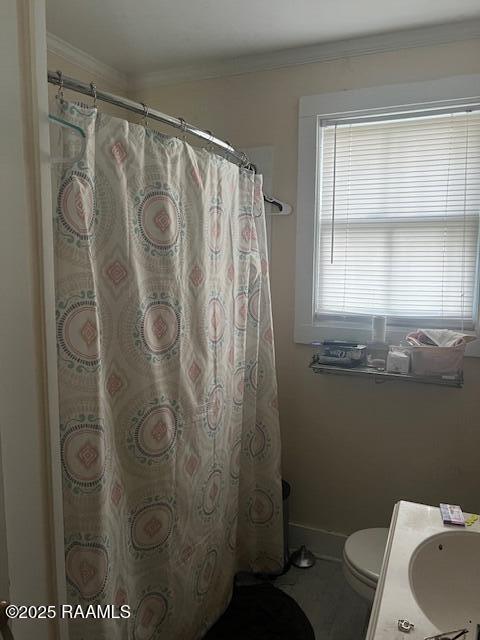 526 E Main St, New Iberia, LA 70560 - full bath with ornamental molding, vanity, and curtained shower